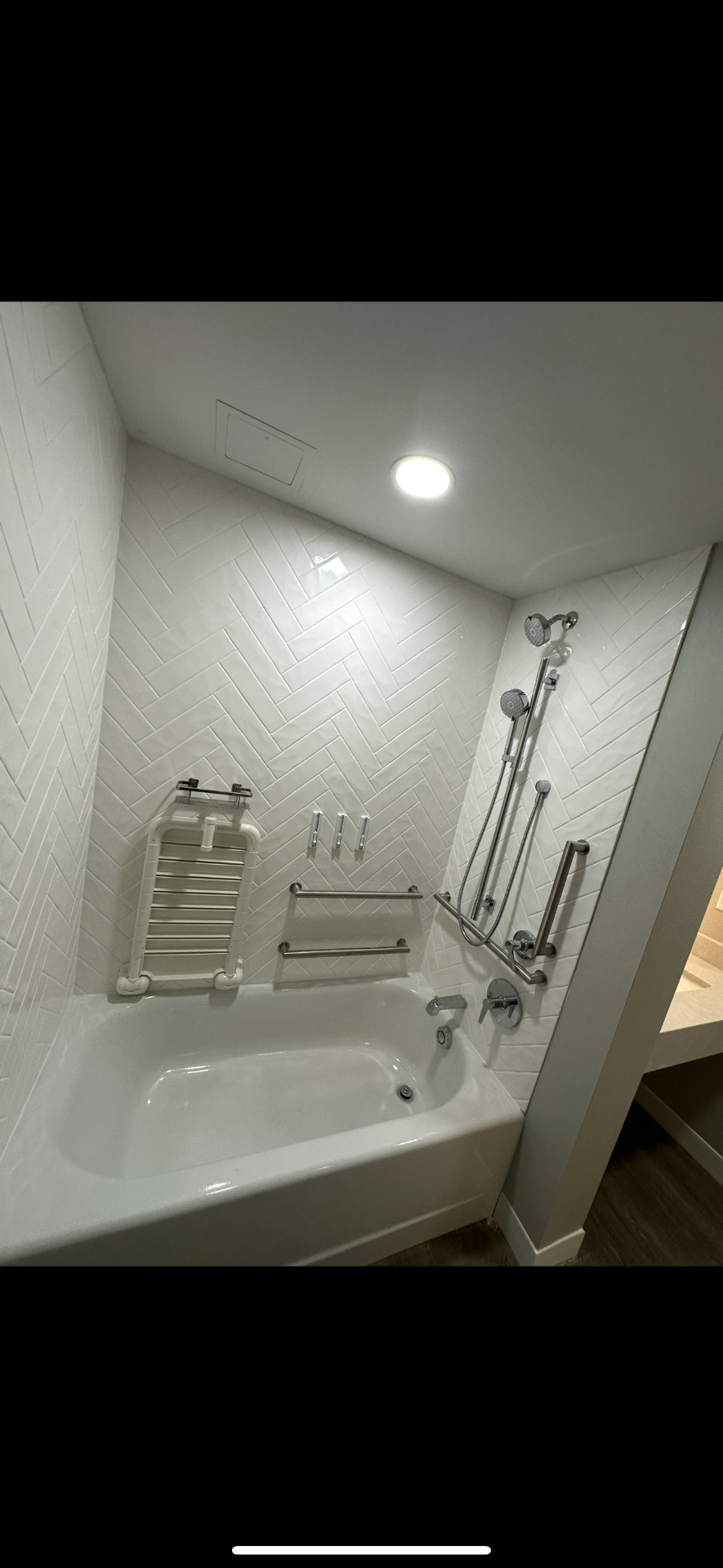 Tub + shower combo with grab bars